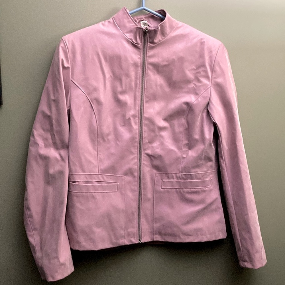 Jessica pink polyvinyl almost fuzzy jacket with pockets.